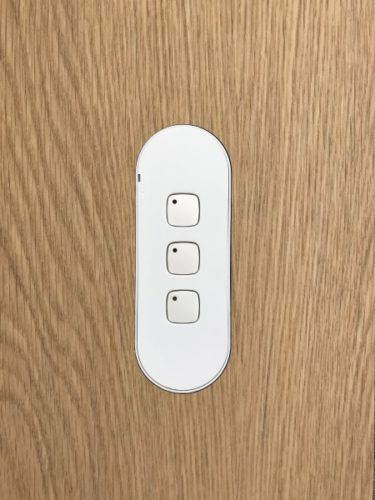 ZETR-Three-Gang-Switch-White-in-NAVText-American-Oak-375x500